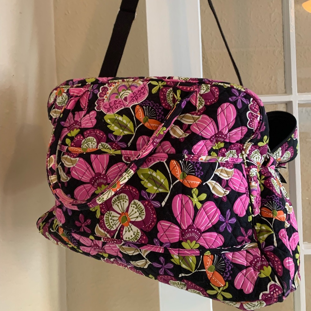Vera Bradley carry on suitcase.